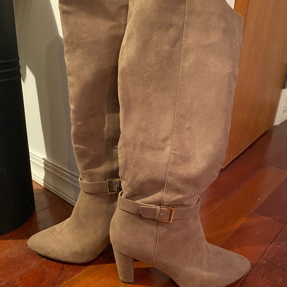 Never worn before high tan boots with buckle!